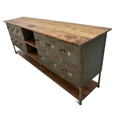 an old metal cabinet with drawers and numbers on the front, sitting against a white background