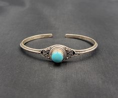 Handmade Beautiful Vintage Sterling Silver Bangle With Natural Turquoise Stone It's Beautiful Handmade Bangle Material Silver Gemstone Turquoise Adjustable Turquoise Vintage Bangle, Adjustable Round Turquoise Bangle, Bohemian Turquoise Round Cuff Bracelet, Bohemian Turquoise Cuff Bracelet, Bohemian Style Turquoise Round Cuff Bracelet, Traditional Turquoise Round Bracelets, Traditional Round Turquoise Bracelet, Traditional Turquoise Round Bracelet, Afghan Jewelry