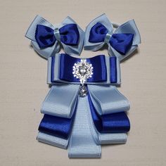 Set of tie and two bows.  Navy blue and blue color.  Bows are 7,5cm and on hair band. Tie are attached to a pin. All orders are shipped Lietuvos Pastas with tracking number. Custom requests are gladly accepted. Please check out the rest of my shop for additional hair accessories. Thank you. http://www.etsy.com/shop/ForYourPrincesses PLEASE NOTE: if you need an item by a specific date please message me prior to ordering to discuss. Thank you. Blue Bow Tie With Ribbon As A Gift, Elegant Blue Ribbon Bow, Blue Ribbon Bow For Party, Blue Party Bow With Ribbon, Adjustable Blue Bow With Ties, Blue Adjustable Bow With Ties, Adjustable Blue Bow Ties, Adjustable Blue Bow Hair Accessories, Blue Adjustable Bow Hair Accessories