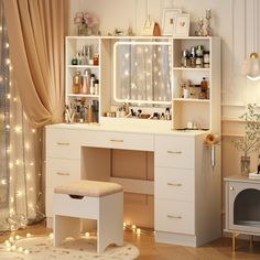 a white vanity with lights on it and a stool in front of the counter top