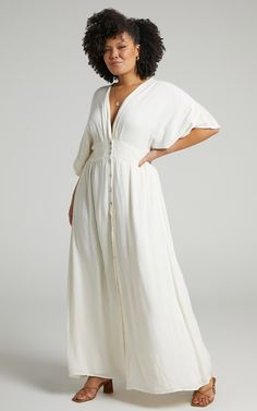 Sitting Pretty Maxi Dress In Natural | Showpo V-neck Maxi Dress With Button Closure For Daywear, Flowy V-neck Maxi Dress With Buttons, V-neck Maxi Dress With Buttons For Date Night, V-neck Maxi Dress With Buttons For Daywear, White Maxi Dress With Buttons, Flowy Maxi Dress With Buttons For Brunch, Casual V-neck Rayon Maxi Dress, V-neck Rayon Maxi Dress For Casual Wear, Flowy Spring Maxi Dress With Button Closure