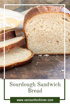 a loaf of sourdough sandwich bread sitting on top of a wooden table