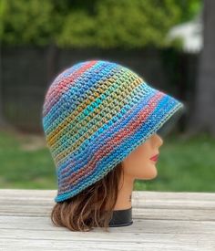 The colors in this bucket hat are so pretty! Wear it with the brim rolled up or down to keep the sun out of your eyes Crocheted using my favorite soft acrylic yarn  Hand wash cold and lay flat to dry Multicolor Short Brim Cloche Hat For Beach, Adjustable Multicolor Cloche Hat For Beach, Multicolor Casual Cloche Hat For Beach, Casual Multicolor Cloche Hat For The Beach, Casual Multicolor Cloche Hat For Spring, Casual Multicolor Cloche Hat For Beach, Multicolor Brimmed Cloche Hat For Summer, Summer Multicolor Brimmed Cloche Hat, Multicolor Crochet Hat With Curved Brim For Outdoor