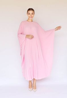 "A special collection with pleated kaftan in fan-style will bring the best \"new\" look for any occasions you may attend. Classic but chic !. It's totally smoothly flowy, soft and gentle touch. FEATURES - Light Pink  - Pleated - Personal Custom Made - Full Length Kaftan  - Designer Silk Kaftan - Plus Size and Custom Length - Resort Wear, Beach Wear, Lounge Wear, Pool Cover Up Kaftan - Boat Neck -------------------------------- DETAIL  * The maximum length : 134 CM ( please be noted, this can not Pink Pleated Vacation Dress, Oversized Pink Maxi Dresses, Pink Pleated Maxi Dress For Vacation, Flowy Pleated Pink Maxi Dress, Flowy Pink Pleated Maxi Dress, Elegant Pink Beach Cover-up Dress, Elegant Pink Dress For Beach Cover-up, Elegant Pink Kaftan For Beach Cover-up, Oversized Pink Maxi Dress For Vacation