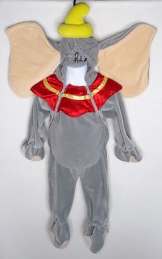 an elephant costume hanging on the wall