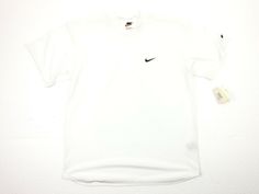 Brand: Nike Size: Medium Color: White Condition: Pre-Owned Condition ** Please keep in mind anything over 10 years old is most likely going to have some staining, fading, cracking and small snags or holes.** Please see all pictures!!! Nike White, T Shirt Men, White Nikes, Shirt Men, Keep In Mind, Chef's Jackets, Dri Fit, Shopping List, Men's Polo Shirt