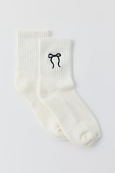 Ultra-soft crew socks with bow detailing at the ribbed cuff. Features Bow quarter crew socks Super soft crew socks Bow detailing at the ribbed cuff Content + Care 80% Cotton, 18% polyester, 2% spandex Machine wash Imported Size + Fit Quarter crew length Fits US women’s shoe size 6–10 | Bow Quarter Crew Sock in White/Black Bow, Women's at Urban Outfitters White Socks, Men's Shoes Accessories, Women Men Shoes, White Sock, Brand Sale, Black Bow, Crew Socks, Birthday Wishes, Women's Accessories