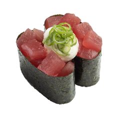 two pieces of sushi with cucumber on top