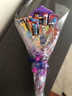 the candy bouquet is wrapped in clear cellophane