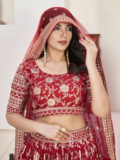 Introducing our stunning "glamorous red zari embroidered jacquard wedding lehenga choli" that is sure to make you stand out at any wedding or special occasion. This exquisite ensemble features a red color jacquard lehenga with intricate zari embroidered work and sequin work, paired with a matching jacquard choli and net dupatta. The lehenga is semi-stitched up to 42 inches, allowing for a perfect fit, while the choli comes as unstitched material for customization. The net dupatta with four side Red Banarasi Silk Saree For Reception, Reception Banarasi Silk Red Saree, Red Sets With Resham Embroidery For Traditional Ceremonies, Red Art Silk Wedding Set, Red Art Silk Anarkali Set For Wedding, Wedding Brocade Sets With Meenakari Details, Red Embroidered Fabric For Unstitched Blouse For Diwali, Red Banarasi Silk Lehenga With Intricate Embroidery, Red Dola Silk Lehenga With Dupatta