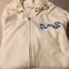 Gap Hooded Sweatshirt Brand New Hoodie Beautiful In The Front It’s Says Gap In Light Blue With Blue Flowers On It I Sporty Gap Sweatshirt With Adjustable Hood, Gap Sporty Top With Drawstring Hood, Sporty Gap Top With Drawstring Hood, Gap Cotton Hooded Top, Gap Hooded Top With Drawstring, Gap Hooded Top With Drawstring Hood, Casual Gap Tops With Drawstring Hood, Sporty Gap Tops For Winter, Gap Casual Sweatshirt With Adjustable Hood