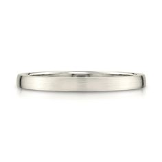 a white gold wedding ring on a white background