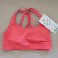 Brand New. I Cut Tag Before Trying On And Then It Didn't Fit. Lululemon Sports Bra. Color Is Like A Coral. Size 4 Lululemon Poshmark, Lululemon Wishlist, Cheer Fits, Lulu Lemon Sports Bra, Camp Outfits, Lulu Sports Bra, Running Outfits, Cute Summer Shirts, Sports Attire