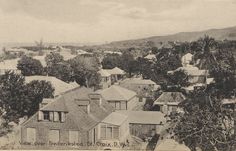 an old black and white photo of some houses