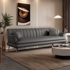 a modern living room with grey couches and coffee table