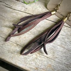 "-These tassel earrings are made from soft chocolate-color deerskin leather. Part Western, part Boho, part Rock 'n Roll, these little fringe earrings give a big kick to any outfit. -Lightweight enough to wear every day. -3\" - 3.5\" total length, including earwires. -Earwires are antique-brass. -Deerskin leather is sustainably sourced in the USA. -Ok to get wet. -Available in 10 colors. -Designed and handmade in South Pasadena, CA. Check out more of our awesome earrings here: https://www.etsy.co Elegant Brown Adjustable Tassel Earrings, Brown Fringed Tassel Earrings Gift, Brown Fringe Tassel Earrings For Gift, Brown Fringe Tassel Earrings As Gift, Elegant Brown Dangle Tassel Earrings, Brown Dangle Earrings With Tassels, Brown Fringe Tassel Dangle Earrings, Brown Fringe Dangle Tassel Earrings, Brown Dangle Tassel Earrings With Fringe