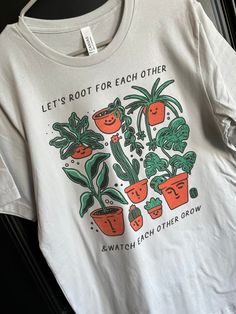 "Let's Root for Each Other and Watch Each Other Grow design made on Bella Canvas shirt. Shown on a \"silver\" tee. Message me if you have any questions!" Graphic Tees Teacher, Spring Shirt Ideas, Cute Tshirt Designs Graphic Tees, Cute Shirts Aesthetic, Cute T Shirt Designs, Etsy Shirts, Surfergirl Style, Cute Tshirt Designs, Garden Shirt