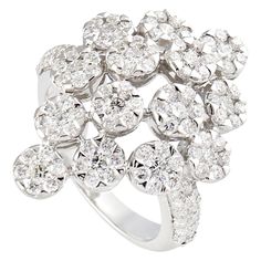 a white gold and diamond cluster ring, by van cleef for cartier