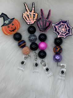 Show off your Halloween spirit at work with these cute badge reel! Options B and D glow in the dark! Themed Black Badge Reel As A Gift, Themed Black Badge Reel For Gifts, Themed Black Badge Reel For Gift, Themed Black Badge Reel Gift, Novelty Black Badge Reel For Halloween, Novelty Black Badge Reel Customizable, Customizable Novelty Black Badge Reel, Customizable Black Novelty Badge Reel, Customizable Black Badge Reel