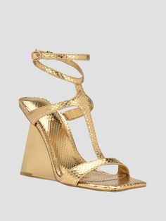 Showcase your style in these metallic heels featuring a T-strap vamp design with snakeskin texturing, open toe and unexpected sculptural wedge heel. Wedge Dress, Sandals Gold, Metallic Heels, Strap Wedge, Shoes Heels Wedges, Gold Snake, Dress Sandals, Wedge Sandal, Perfect Day