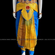 Design by Classical Dance Jewelry® ❥ Traditional Bharatanatyam costume wore during regular dance programs or arrangetram performance. ❥ Material : Art Silk ❥ Type : Traditional pant costume ❥ Easy to wear ❥ layer front fan ❥❥❥❥ 32 inch PANT LENGTH Dress Measurements ( all the measurements approximately 1 -2 margin buffer) Age: 9 - 12 yrs ❥ PANT MEASUREMENTS: ☛ Pant Length: 31-32 inch ☛ Pant Waist: 29-30 inch ☛ Pant Hip: 30-31 ❥ BLOUSE MEASUREMENTS: ☛ Blouse length: 11-12 inch ☛ Blouse Shoulder : Royal Traditional Wear For Diwali In Traditional Drape, Royal Traditional Wear For Diwali, Royal Traditional Wear For Festive Ceremonies, Ceremonial Traditional Wear With Zari Work, Royal Ceremonial Traditional Wear With Zari Work, Royal Traditional Wear With Zari Work For Ceremonial Occasions, Royal Traditional Wear For Ceremonial Occasions, Royal Gold Traditional Wear With Traditional Drape, Traditional Drape Blue Churidar For Festivals