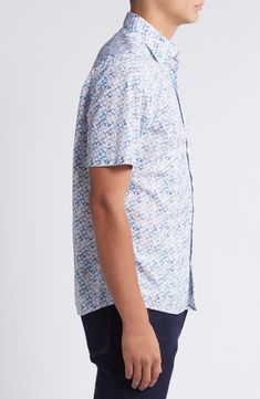 Featuring a watercolor-style microprint, this summery shirt is cut from pure cotton to keep you cool. 29" length, 42" chest (size medium) Front button closure Spread collar Short sleeves 100% cotton Machine wash, line dry Made in Turkey Blue Cotton Shirt With All Over Print, Spring Patterned Short Sleeve Cotton Shirt, Blue Casual Top With Watercolor Print, Casual Blue Watercolor Print Top, Blue Casual Watercolor Print Top, Blue Watercolor Print Tops For Summer, Blue Watercolor Print Tops For Spring, Blue Watercolor Print Top For Spring, Blue Cotton Short Sleeve Shirt With Floral Print