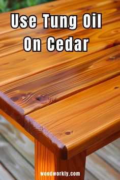 a wooden table with the words use tuing oil on cedar