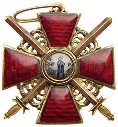 a red and gold colored cross with an image on it