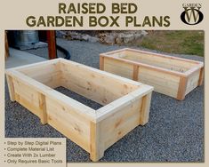 two wooden planters sitting on top of gravel