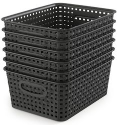 four black plastic baskets stacked on top of each other