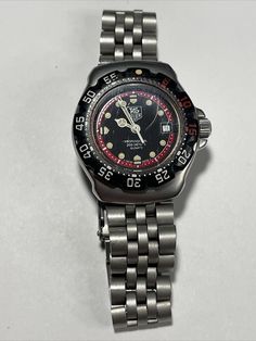 TAG HEUER Women's Formula 1 WA1414 Red Quartz Watch Steel Date 200m | eBay Tag Heuer Women, Watches Women Black, Red Quartz, 200m, Black Watch, Quartz Watch, Formula 1