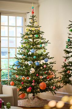 a decorated christmas tree in a living room