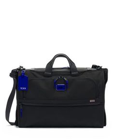 A must-have for the business traveler. Carry up to two suits or gowns in this convenient, compact design and still have room for toiletries. Part of our Alpha 3 Collection, iconic business and travel pieces that bring together innovative design, superior performance, and best in class functionality. Select styles come outfitted with a colorful TUMI Accents Kit (luggage tag, monogram patch, handle wrap and zipper pull ties) for an additional cost. Made from TUMI's signature, ultra-durable FXT� ba Elegant Leather Trim Luggage For Business Trips, Elegant Luggage With Leather Trim For Business Trips, Elegant Leather-trim Luggage For Business Trips, Elegant Travel Bag With Leather Trim For Business Trips, Elegant Business Luggage With Leather Trim, Elegant Travel Bag With Leather Trim, Elegant Luggage With Leather Trim For Travel, Functional Formal Bags With Leather Trim, Classic Formal Travel Bag With Removable Pouch