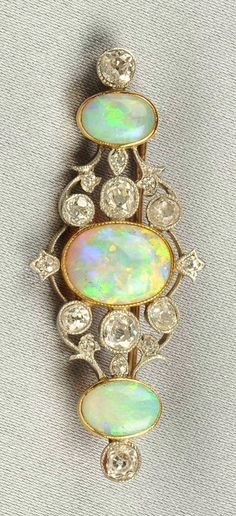 Edwardian Opal and Diamond Brooch, bezel-set with three cabochon opals, further set with old mine-cut diamonds, approx. total diamond wt. 1.20 cts., platinum-topped gold mount, millegrain accents, lg. 1 7/8 in. Antique Engagement Ring, Vintage Things, Gems Jewelry, Pretty Jewellery