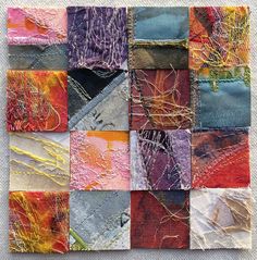 a patchwork quilt with many different colors