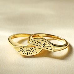 Make a pinky-promise with your best friend with our friendship rings. The ring set is a play on the 80’s trend of gifting a part of a ring to a fellow sister. The signet ring is split into two, with a sunlight design on one ring and a moonlit horizon design on the other. A unique piece which can be worn together or stacked separately.Weight: 5 gWidth: 2 mmHeight: 2.2 mmThickness: 1.5 mmMaterial: 925 SilverPlating Color: Yellow Gold Symbolic Stackable Open Rings For Promise, Stackable Couple Rings For Promise, Trendy Adjustable Stackable Rings For Anniversary, Symbolic Stackable Open Rings For Anniversary, Trendy Open Ring For Promise Occasion, Trendy Open Ring For Promise, Vintage Adjustable Stackable Promise Rings, Adjustable Vintage Stackable Promise Rings, Vintage Adjustable Rings With Sun And Moon Design