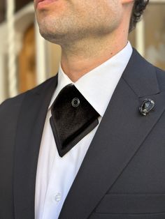 🎩🌟 Step into a realm of opulence with our exquisite diamond-cut neck tie, meticulously handcrafted from premium silky satin and velvet fabrics. Designed to elevate your attire, our tie features a unique diamond-cut velvet layer atop lustrous black satin, adorned with a sleek black shiny button for added sophistication. With its belted neck design, this tie effortlessly adapts to any neck size, ensuring a perfect fit for every gentleman. Suitable for both formal events and everyday elegance, ou Elegant Wedding Suit And Tie Accessories, Classic Silver Tie For Groom, Elegant Tuxedo For Groom, Luxury Business Suit And Tie Accessories, Luxury Ties For Black Tie Events, Elegant Ties For Black-tie Events, Luxury Silver Suit And Tie Accessories For Business, Elegant Ties With Pocket Square For Black-tie Events, Classic Neckwear For Gifts