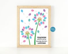 a framed print with the quote teachers plant the seeds of life