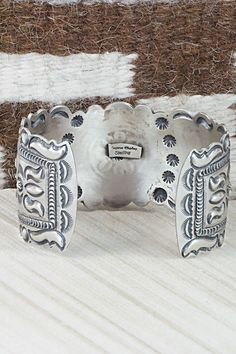 This sterling silver bracelet was made by Navajo silversmith Eugene Charley. The inside is signed and stamped sterling.Size: 5 3/4" (will fit up to a 7" wrist)Gap: 1 1/4"Width: 1 1/2"Free shipping on all orders! We ship with USPS and always include tracking. All orders ship within a day of payment.Returns are accepted up to 30 days after you receive your order. Just send us a message. Our shop offers cash back or store credit. The item must be returned in new condition. Sterling Silver Bracelet, Native American Jewelry, Free Jewelry, Sterling Silver Bracelets, Cuff Bracelets, Silver Bracelet, Gap, Stamp, Bracelet