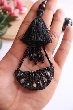 ➤Infuse your Indian garments with our Matt black Tassel Hanging. ➤Product Details: Materials: Beads, pearls, cutdana, crystal Color: Black Usage: Ideal for bridal Indian blouses, dupattas, lehengas, saris, and waist belts Quantity: Pair of 2 tassel latkans ➤➤ Delivery time : 8-14 business days anywhere in the world with standard shipping ➤➤ There may be some difference in color due to lighting and screen settings. Luxury Silver Danglers With Latkans, Traditional Luxury Chandbalis With Latkans, Luxury Chandbalis With Latkans For Women, Cheap Jewelry With Latkans For Diwali, Cheap Chandbalis With Latkans For Wedding, Indian Garments, Indian Blouses, Bridal Indian, Golden Lace