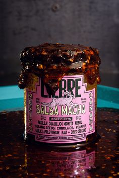 a jar of marmalade sitting on top of a table