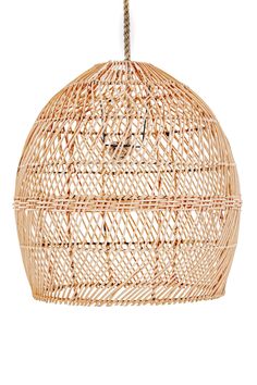 a rattan light hanging from a rope on a white background with the word love written across it