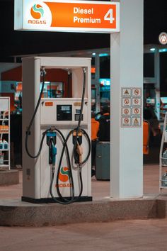 a gas station at night with no people around