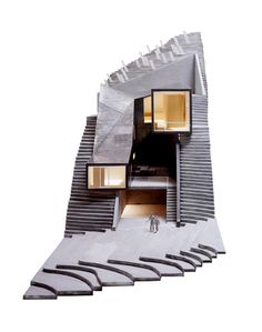 an architectural model of a house with stairs leading up to the upper floor and windows