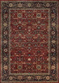 a red and black rug with an ornate design on the center, surrounded by various colored accents