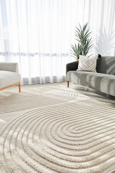 The Lotus Abbey rug presents a modern masterpiece, where design and function converge to create a visually stunning statement. Featuring curved arches articulated through precise high and low pile details, this rug infuses any room with a touch of sophistication. Its subtle interplay of texture e... Beige Textured Rug, Room Visualizer, Natural Jute Rug, Rug Dining Room, Rug Texture, Silver Rug, Clearance Rugs, Natural Fiber Rugs, Brown Sofa