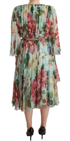 Elevate your wardrobe with this stunning Floral Silk Midi Wrap Dress by Dolce & Gabbana. Gorgeous and brand new with tags, this 100% authentic dress exudes elegance with its luxurious silk fabric and vivid, colorful floral print. Perfect for any occasion, it features a flattering belted waist and a sophisticated midi length, ensuring a silhouette that captures the essence of femininity. Crafted with exceptional care in Italy, this piece isn’t just a dress – it’s a statement of style and quality. Midi Silk Dress, Dolce Gabbana Dress, Stefano Gabbana, Midi Wrap Dress, Italian Craftsmanship, Wrap Midi Dress, V Neck Midi Dress, Dolce E Gabbana, Silk Wrap