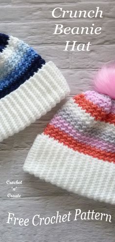 two crochet beanies with pink and blue pom - pom