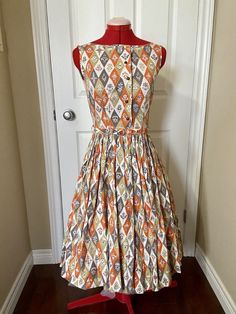 1950s Handmade Harlequin Print cotton dress orange grey white. | eBay Orange Cotton A-line Dress, Orange A-line Cotton Dress, Fitted Orange Cotton Dress, Orange Cotton Knee-length Dress, Harlequin Print, Printed Cotton Dress, Dress Orange, Orange Grey, Cotton Dress