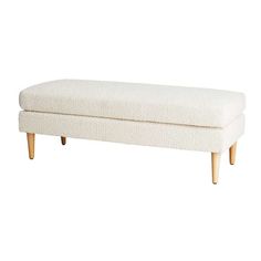 a white bench with wooden legs on a white background